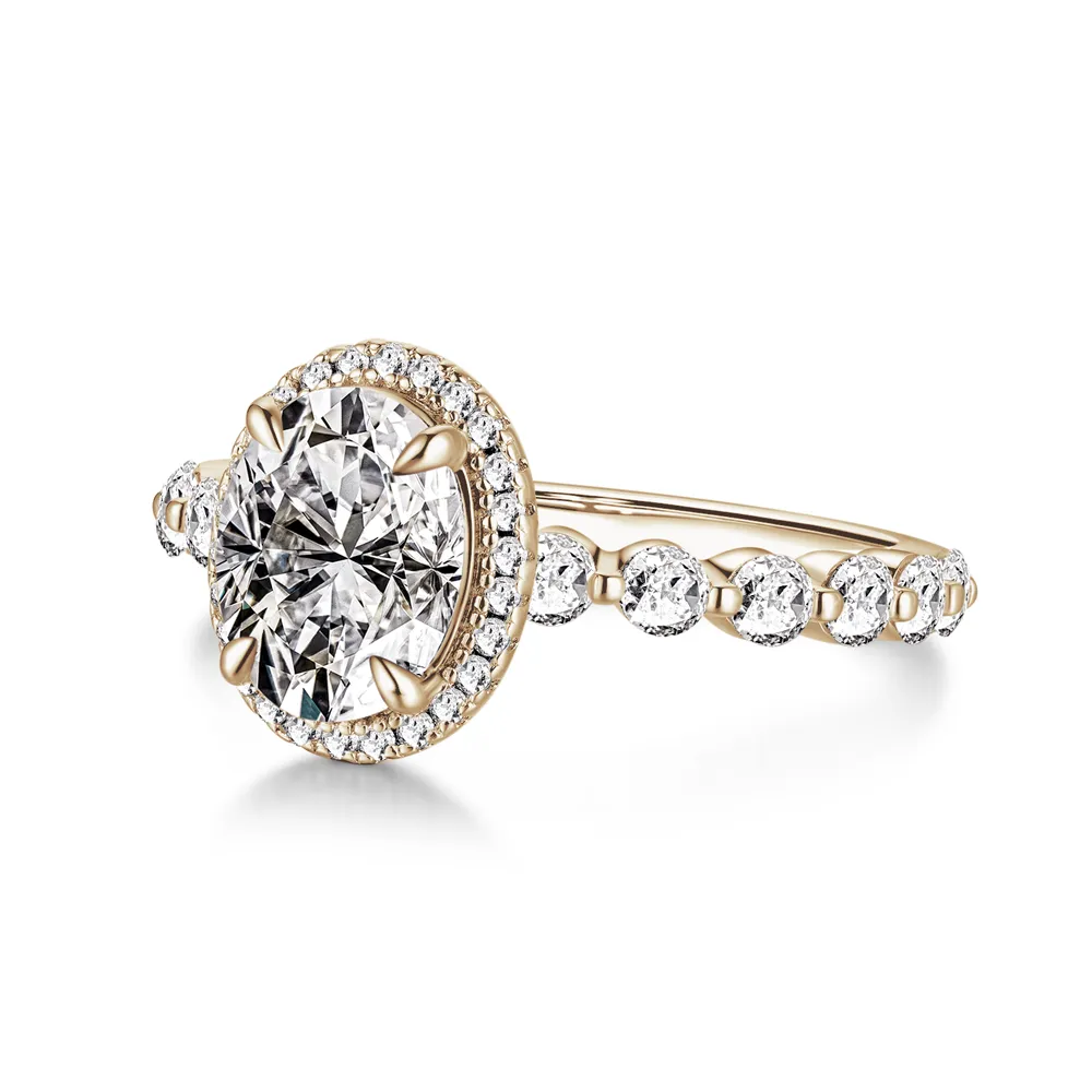 Oval Cut Halo Engagement Ring with Pavé Shared Prong Band