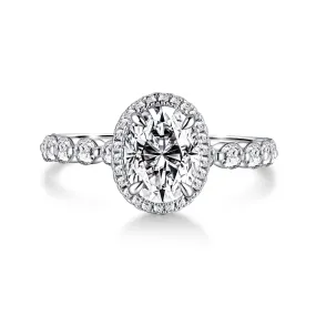 Oval Cut Halo Engagement Ring with Pavé Shared Prong Band